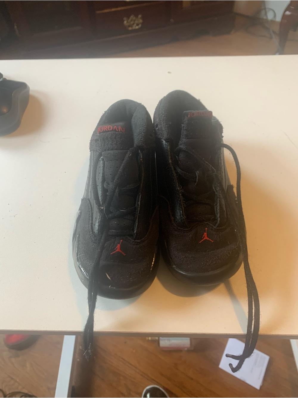 Jordan Black Sneakers with Red Jumpman Accent